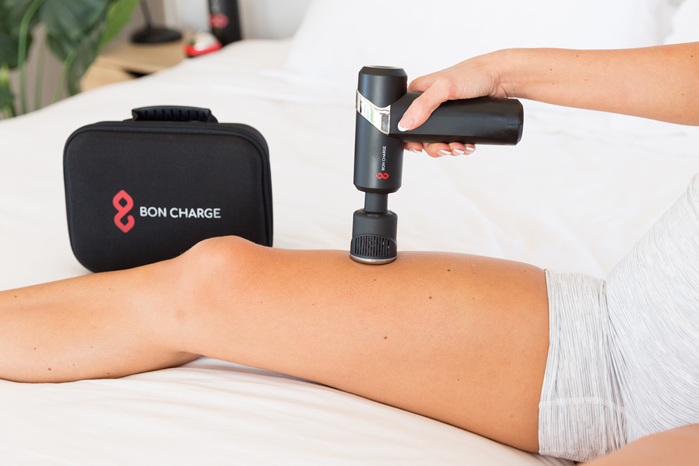 Cold & Heat Therapy Massage Gun Applied to Leg